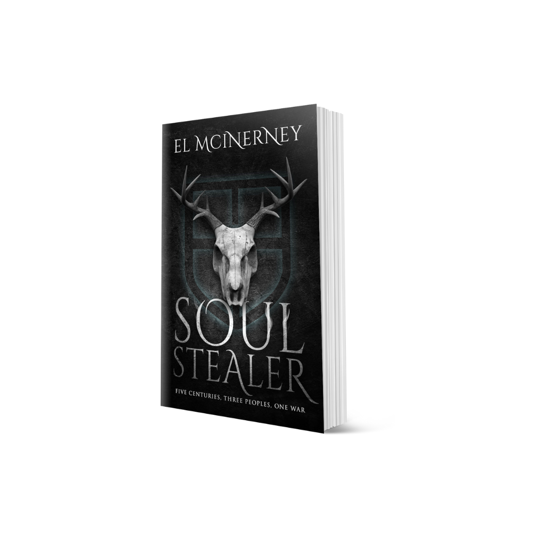 Signed paperback edition of the book 'Soulstealer' by El McInerney, featuring a black and silver cover design with a skull and antlers motif.
